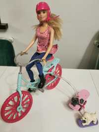 Lalka Barbie oryginalna  na rowerze z jeżdżącym pieskiem