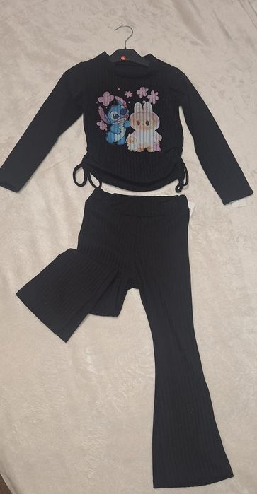 Conjunto de cor preta com bonecos