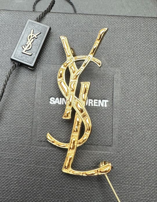 Broszka YSL złota 5,3 cm