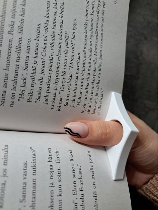 Тримач для сторінок