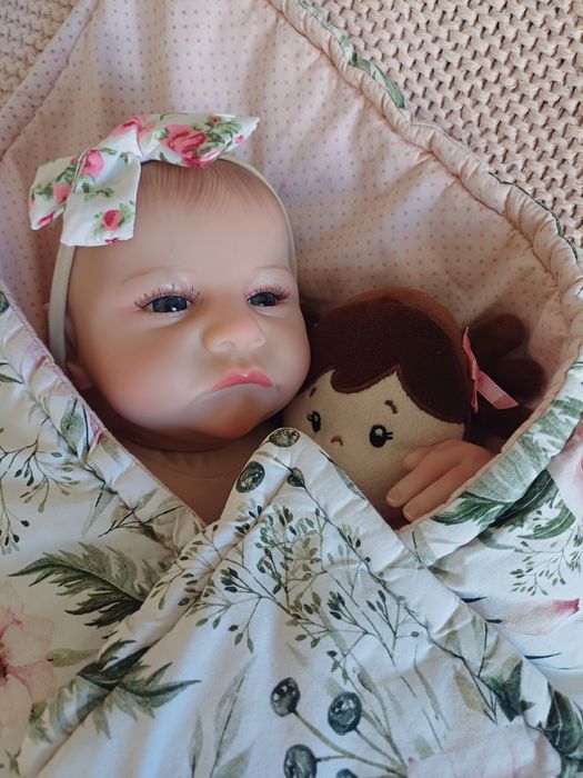 Lalka w typie reborn, drobna wada