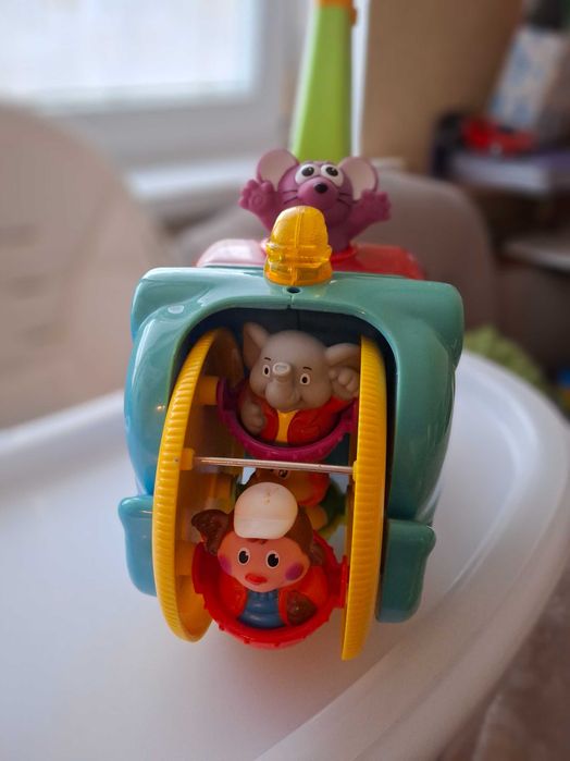 Іграшка каталка слон російською мовою