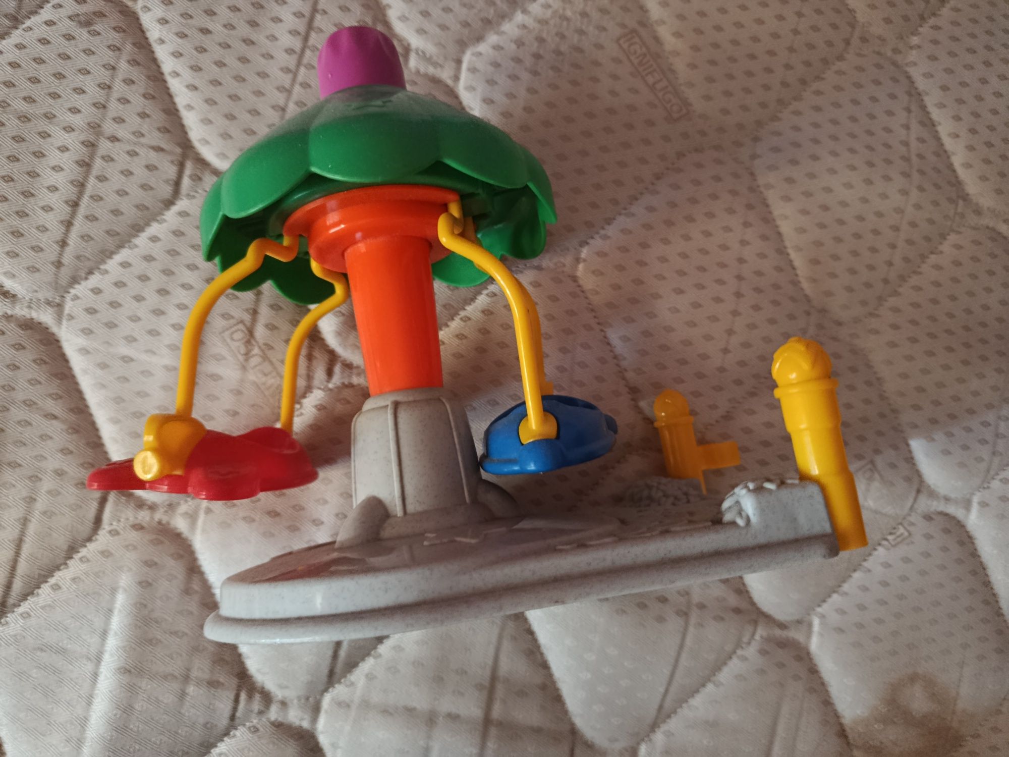 Carrossel fisher price para bonecos