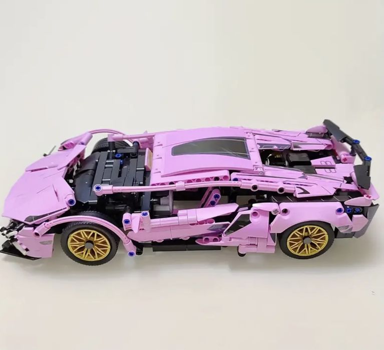 Контсруктор 1300 дет спортивна машина 36*17см lego technic рожева