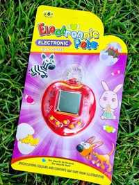 Czerwone Tamagotchi nowa zabawka kieszonkowa dla dziecka