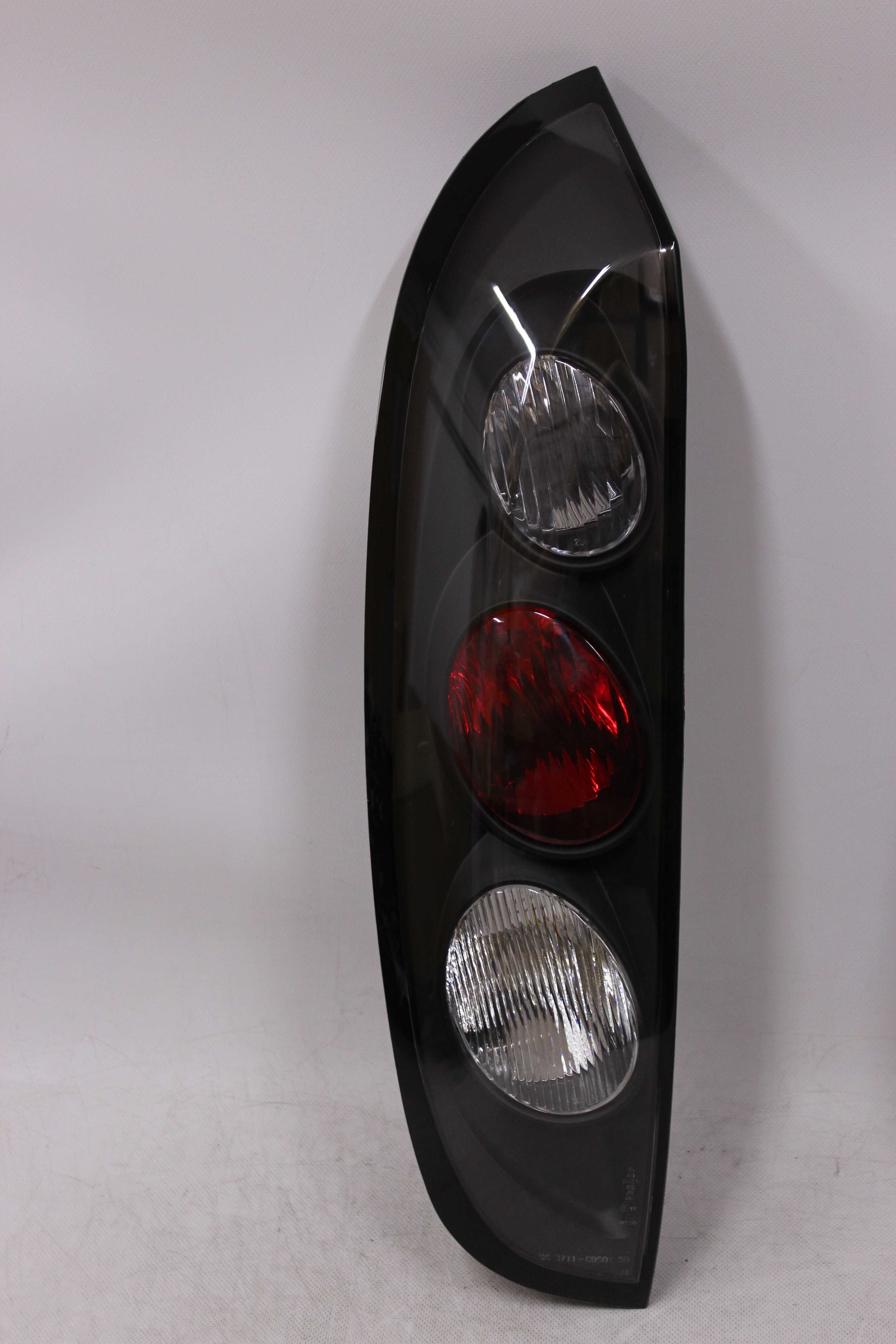 Lampy światła tył tylne OPEL CORSA C III 00-06 TUNING Black SMOKE NOWE