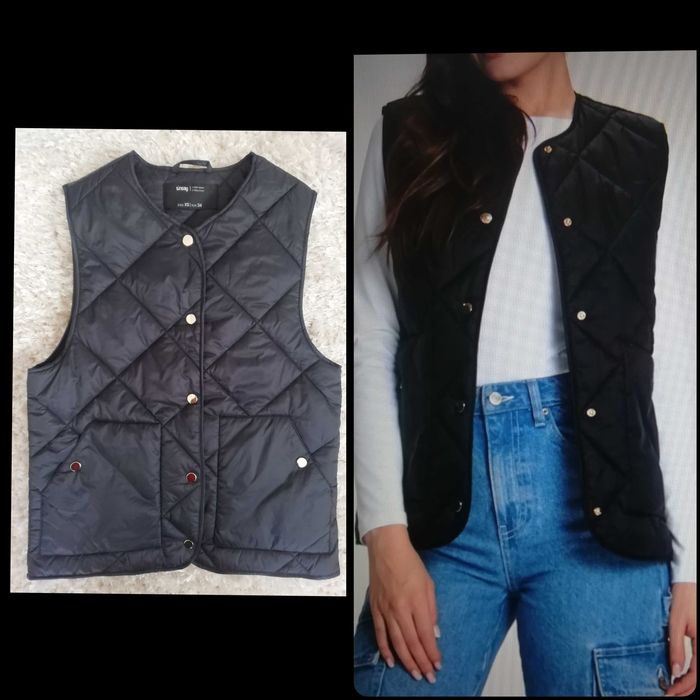 Чорний стьобаний жилет на кнопках, носився 1 раз