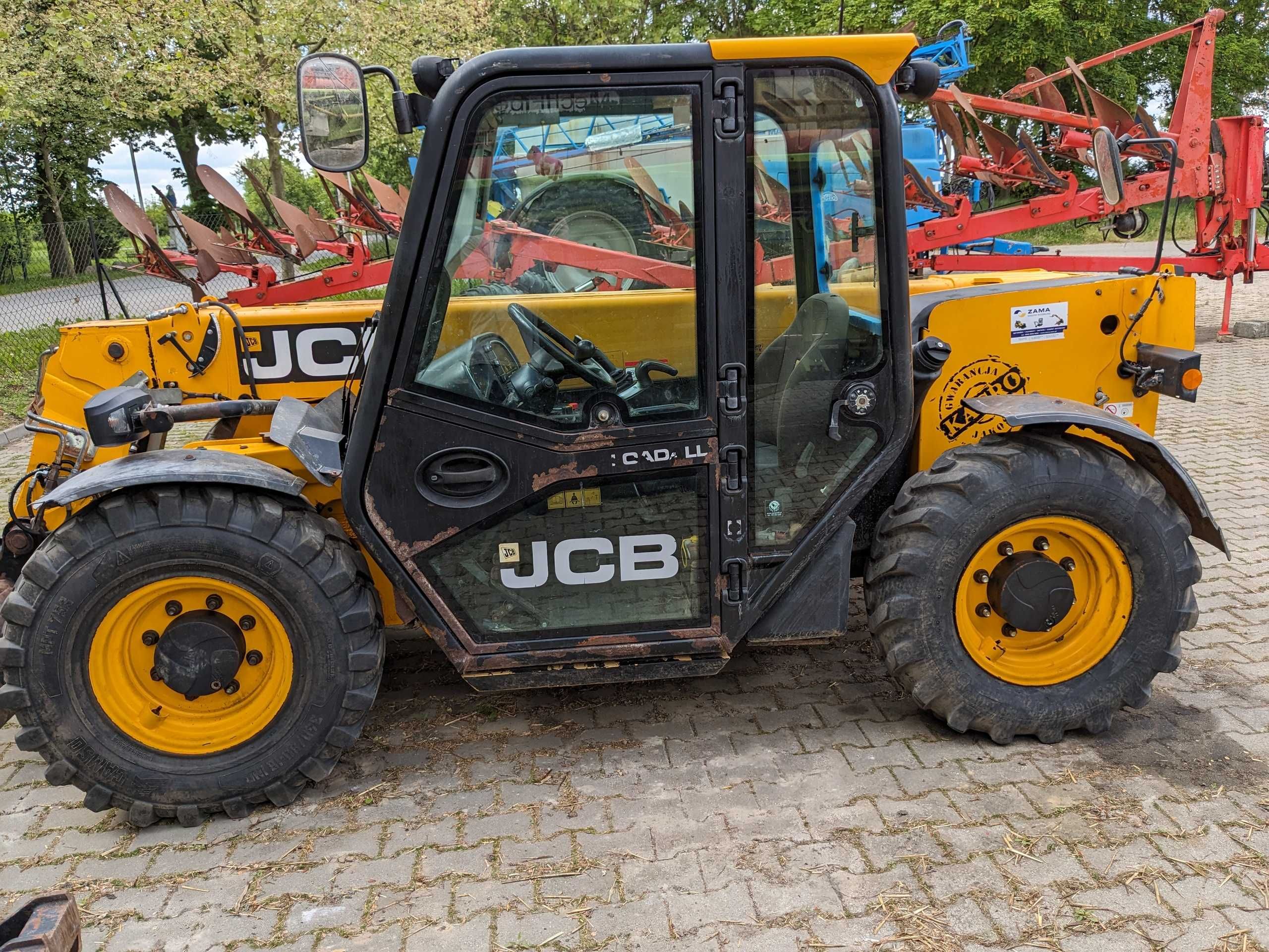 Ładowarka JCB 525.60 z osprzętem, frezem do kiszonki