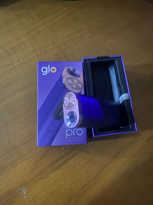 Máquina Glo em caixa com carregador como nova