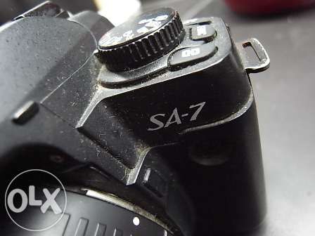 Máquina fotográfica Sigma SA7 reflex lente 28-70