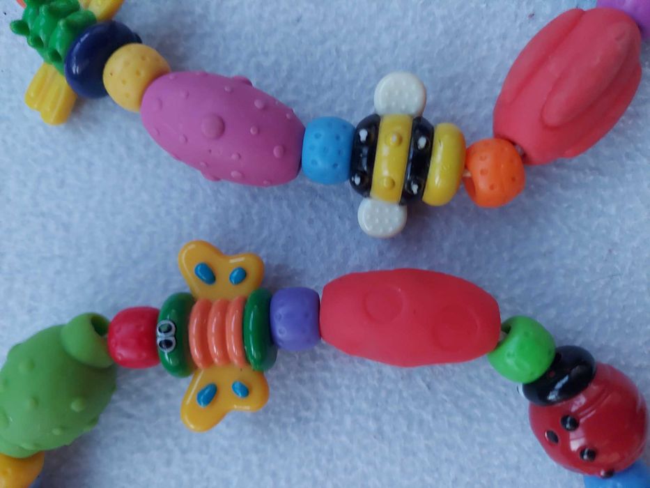 Успокаивающий прорезыватель Nuby Bug-a-Loop Teether 3 +