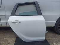 Drzwi prawy tył kompletne OPEL ASTRA IV J KOMBI Y40R 10-15