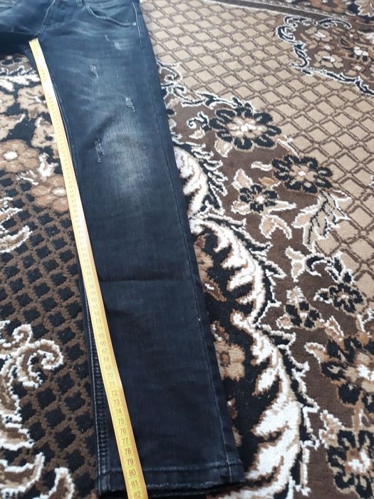 Нові джинси чорного кольору