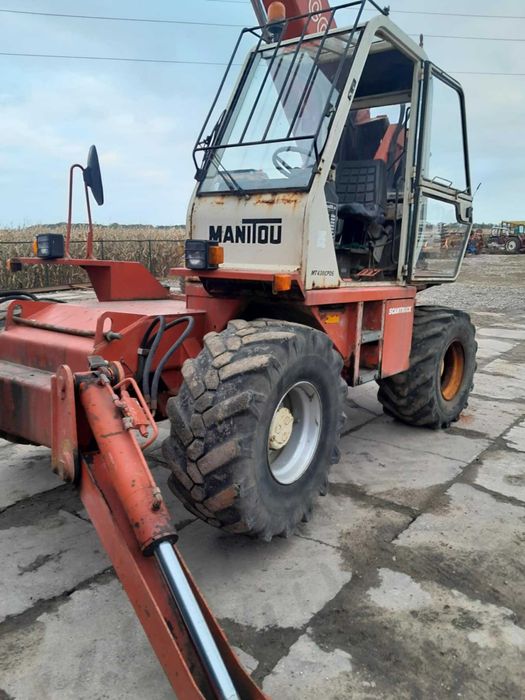 Ładowarka teleskopowa budowlana Manitou  jcb