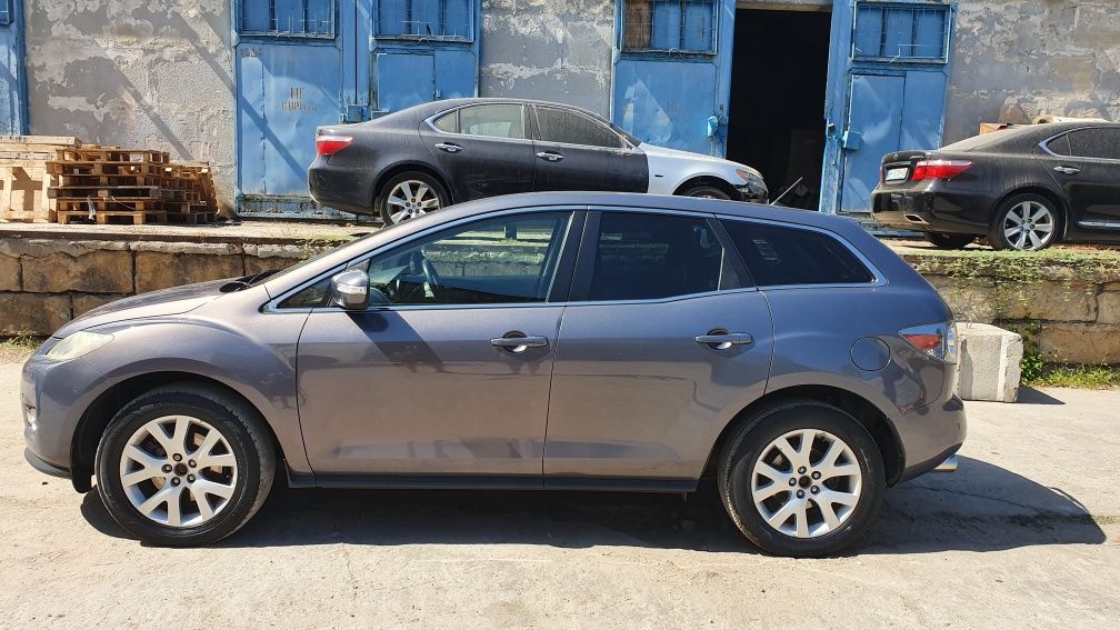 Mazda CX7.Запчасти, разборка,фара,капот,крыло,бампер,дверь,двигатель