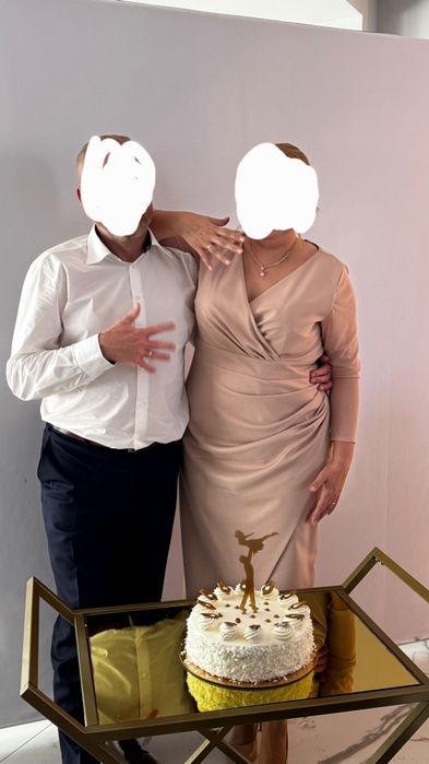 Sukienka rozmiar. 46-48. Kolor pudrowy róż.