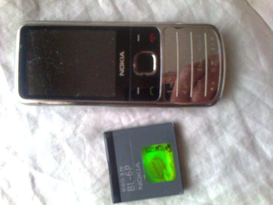 6700-c1 srebna.Nokia E66.