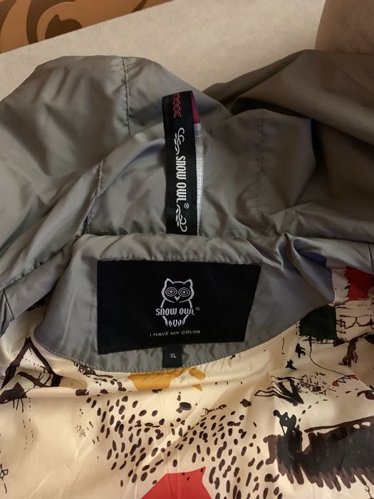 Пуховое пальто фіалетового кольору