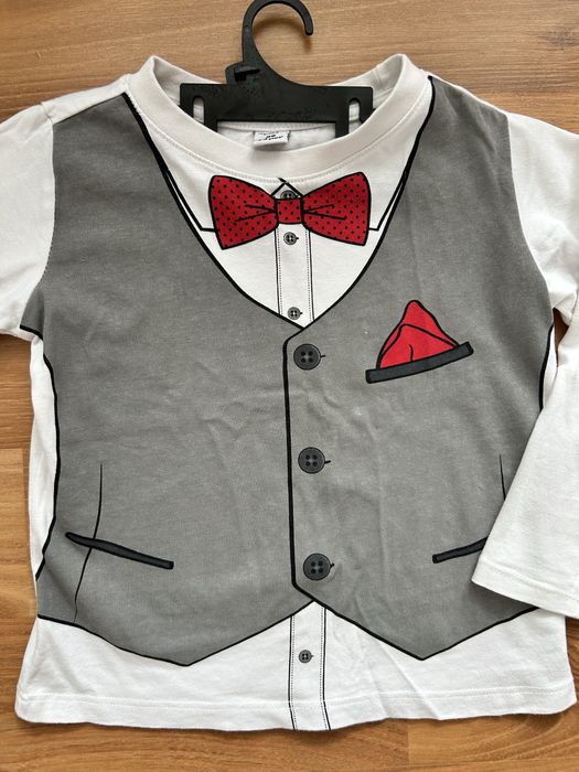 Biała bluzka elegancka galowa kamizelka muszka print poszewka guziki