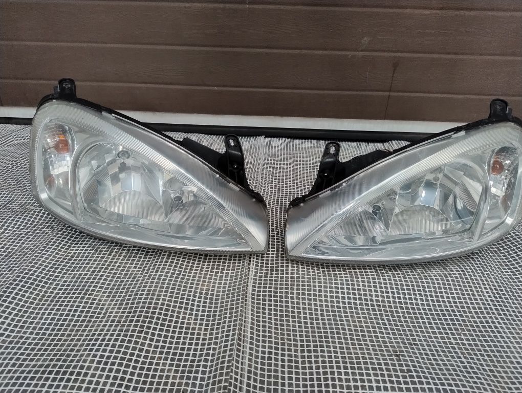 Opel Corsa c lift Europa lampa reflektor prawy lewy komplet DJ auto