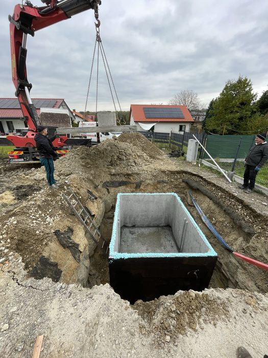 Montaz zbiorników betonowych, przyłacza, dreny