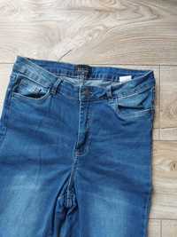 Spodnie jeans mohito 38