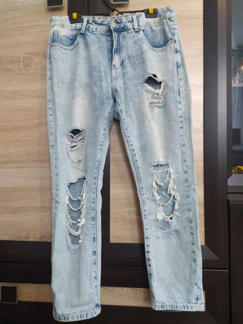 Стильні рвані джинси