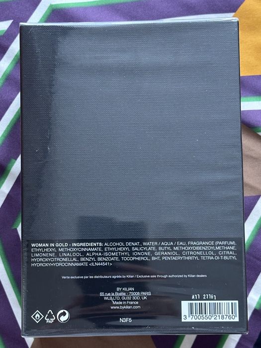 Kilian woman in gold