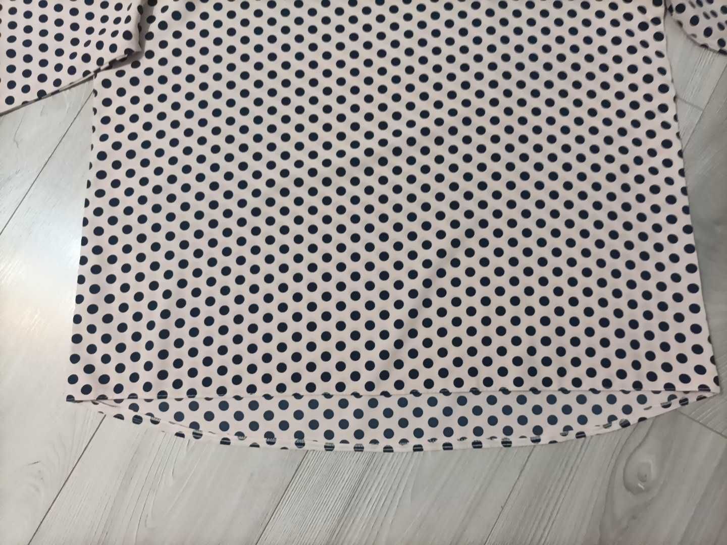 Elegancka bluzka z rękawem 3/4 w rozmiarze 46