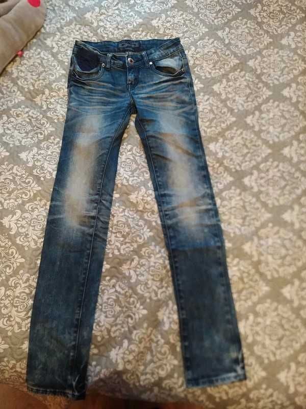 Damskie spodnie jeans 36