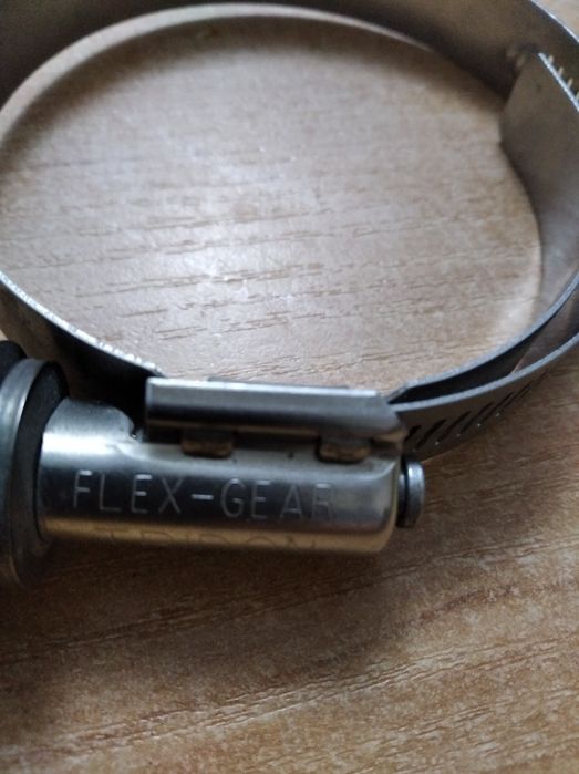 Opaska taśmowa że sprężyną  kompensacyjną