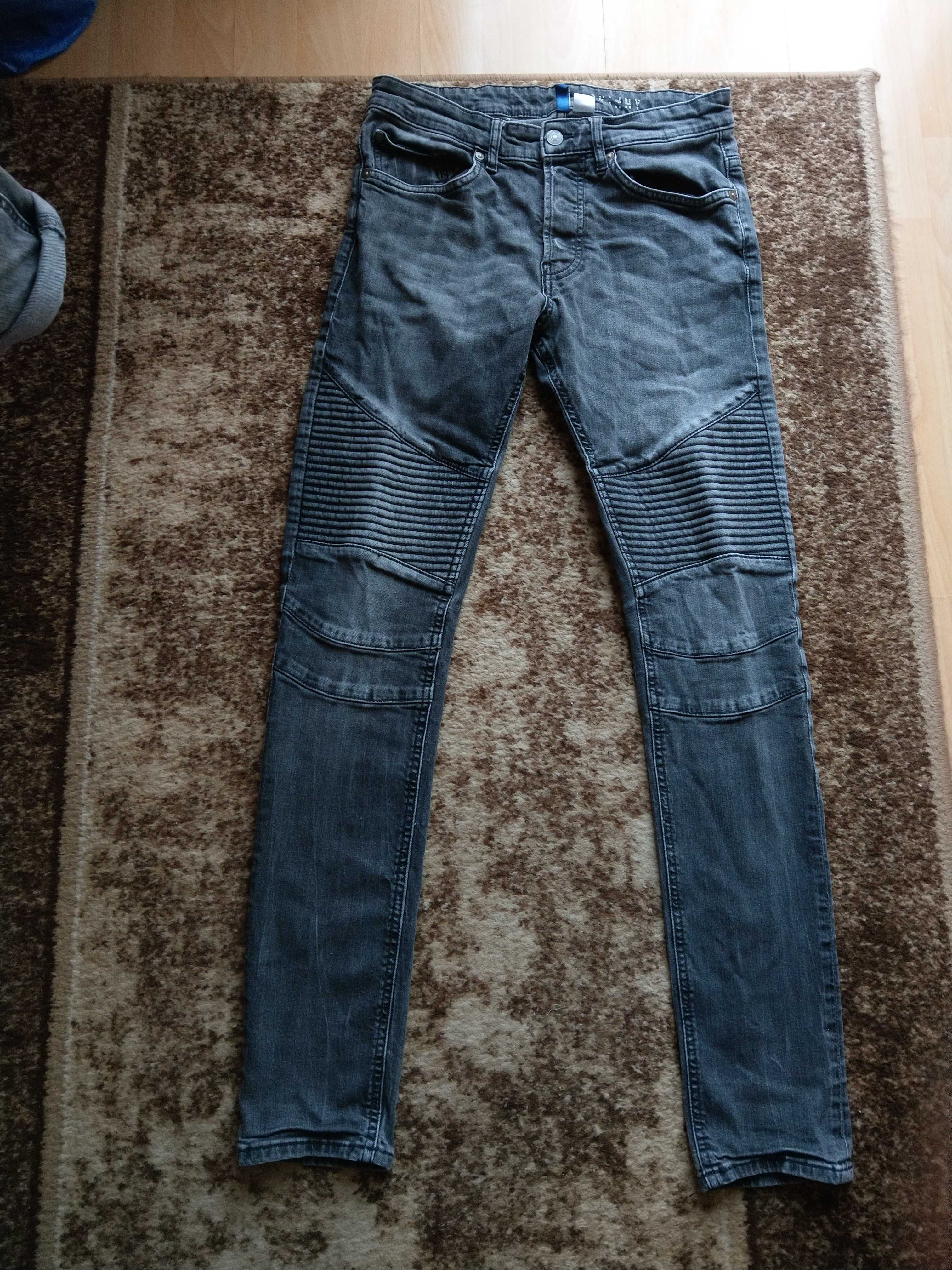 spodnie jeansowe z przetarciami i przeszyciami Divided H&M skinny fit