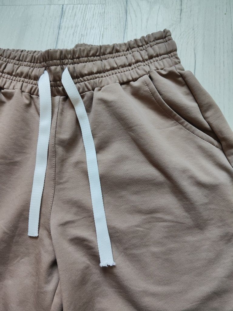 Жіночі штани бежевого кольору, 44 розмір