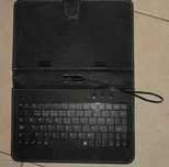 Capa universal 7", com teclado com entrada micro usb "nova"