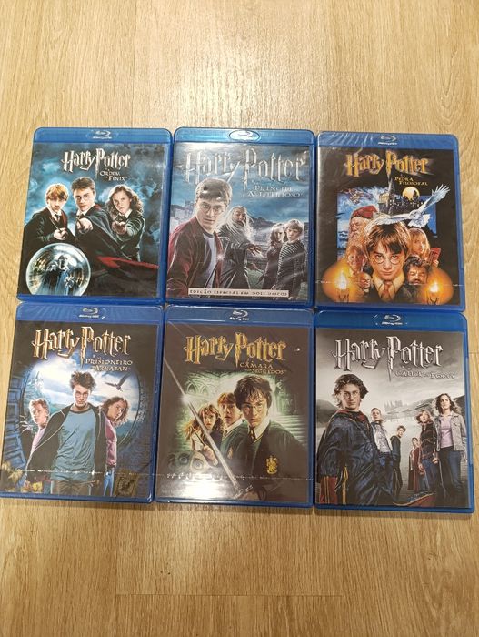 PS4+2 comandos+Auscultadores+10 jogos+6 bluerays(saga Harry Potter)+