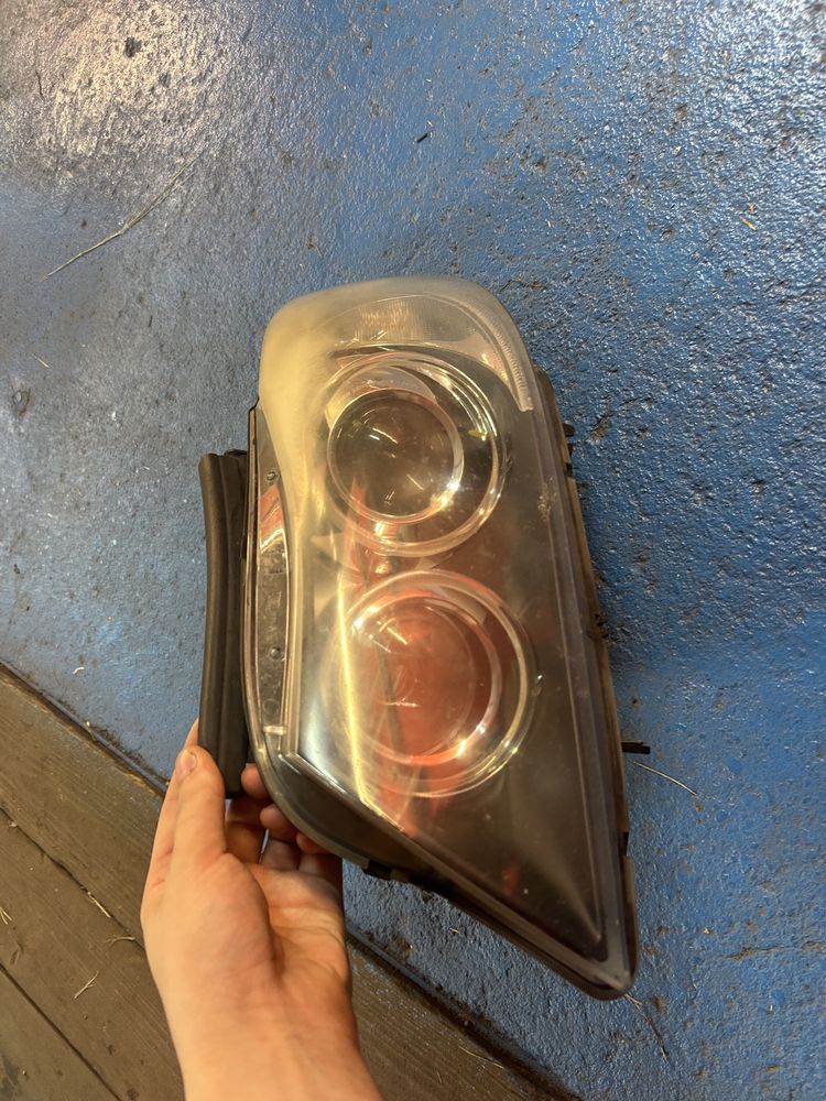 Lampa przednia lewa xenon  Bmw seria 3 e90