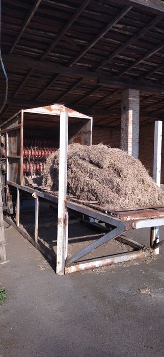 Розривач тюків до соломорізкі.