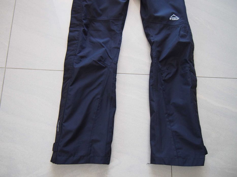 Spodnie trekkingowe przeciwdeszczowe 158 164 cm mckinley