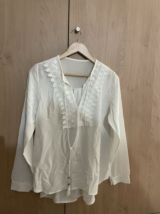 Camisa branca.