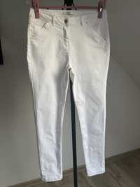 Elastyczne białe cienkie jeansy rurki George r.40