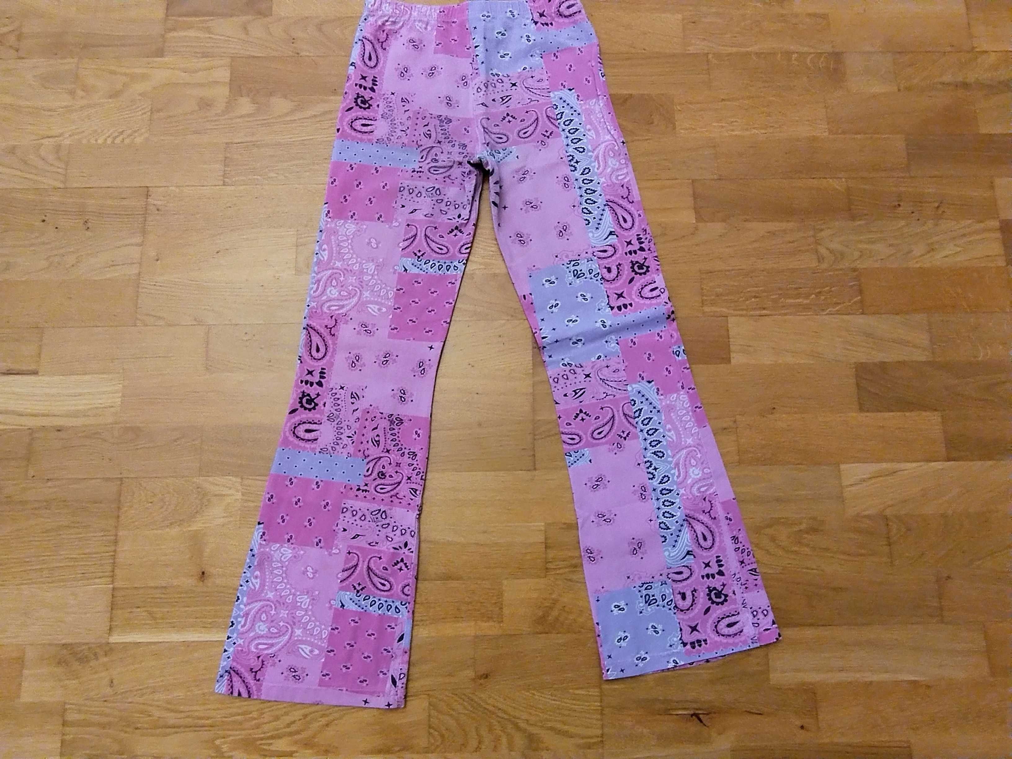 Legginsy dzwony Coccodrillo 158 spodnie materiałowe dziewczęce różowe