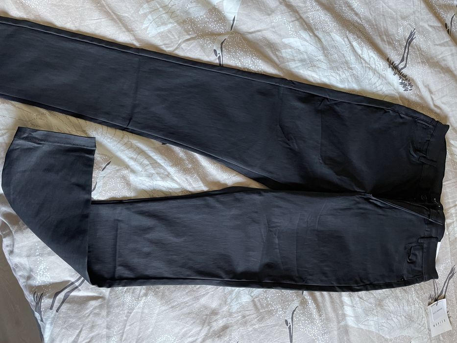 Nowe woskowane spodnie mohito skinny 42