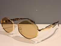 PRADA zlote damskie nowe okulary przeciwsłoneczne panterka logo