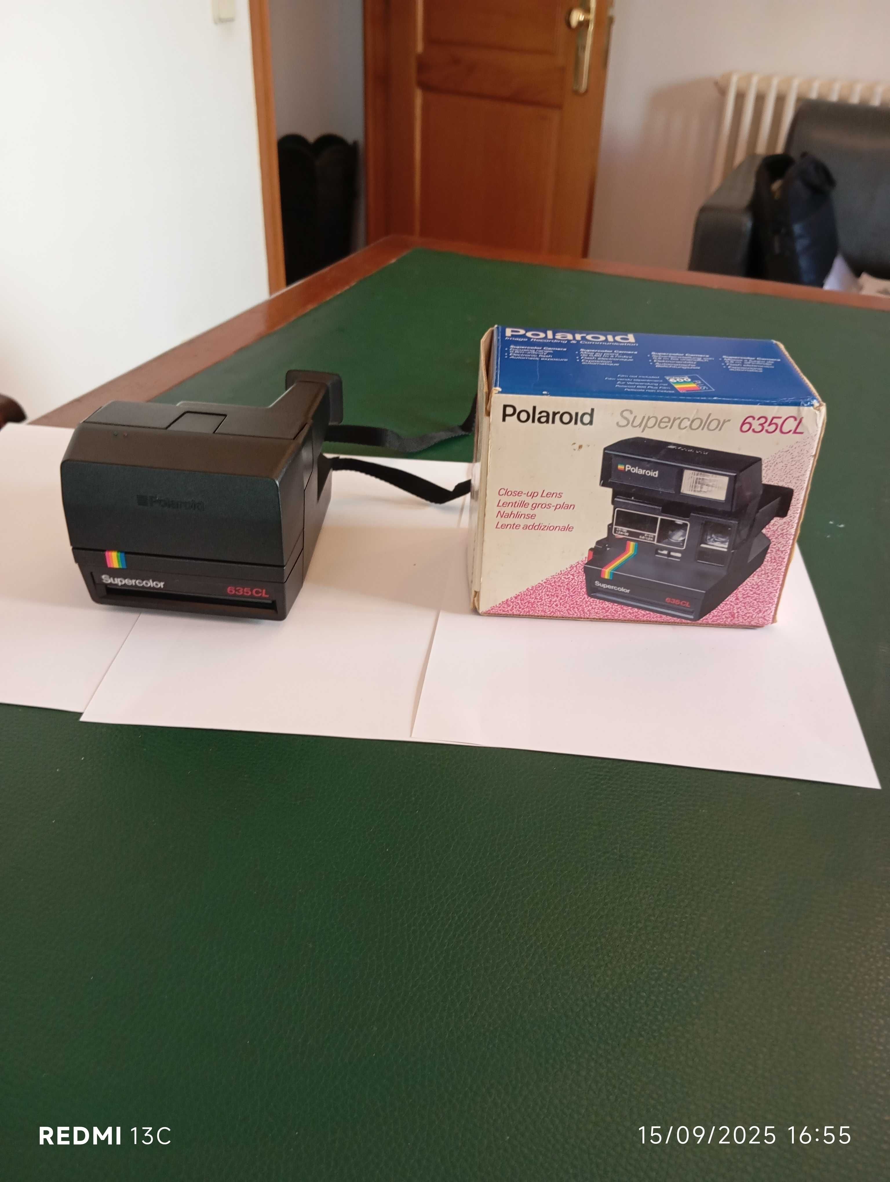 "lote" com secretária, mesa redonda e máquinas fotográficas