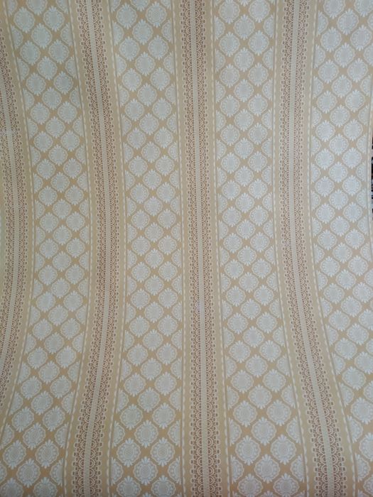 Абсолютно нові паперові шпалери 2 рулона по 25 метрів .