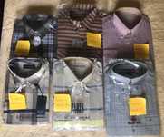 Camisas de homem novas