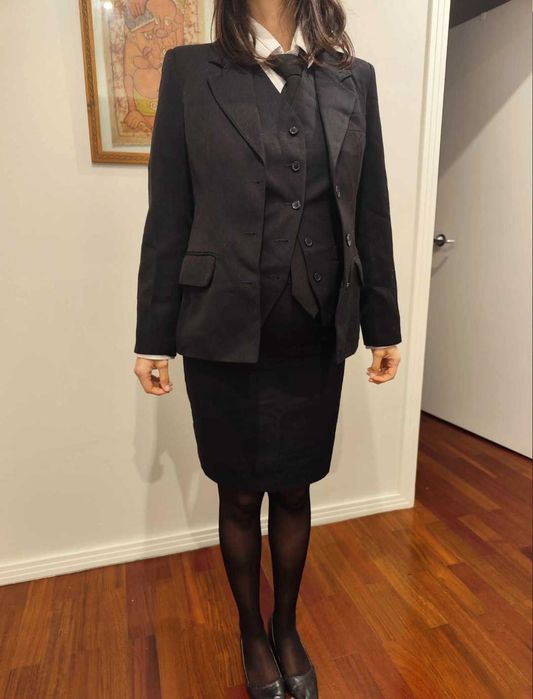 Traje académico feminino