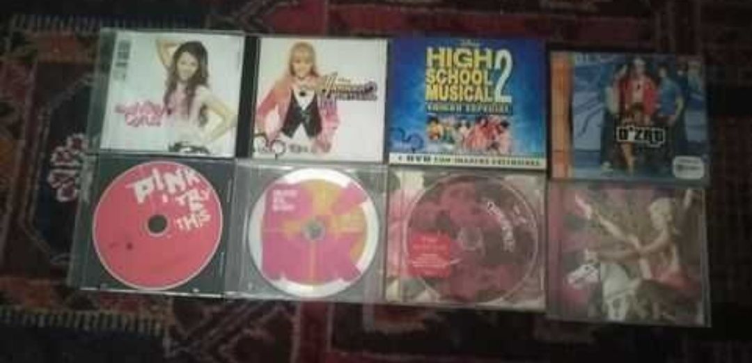 CDs música (pink, hanna montana, miley cyrus, d'zrt)