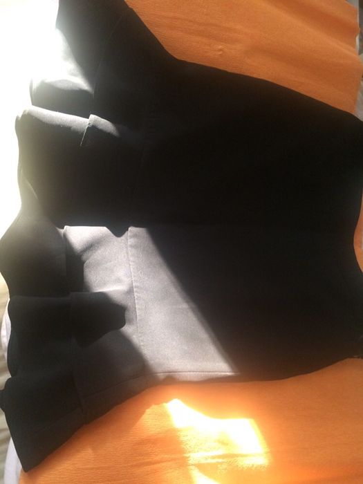 черная юбочка по фигуре с  валанами