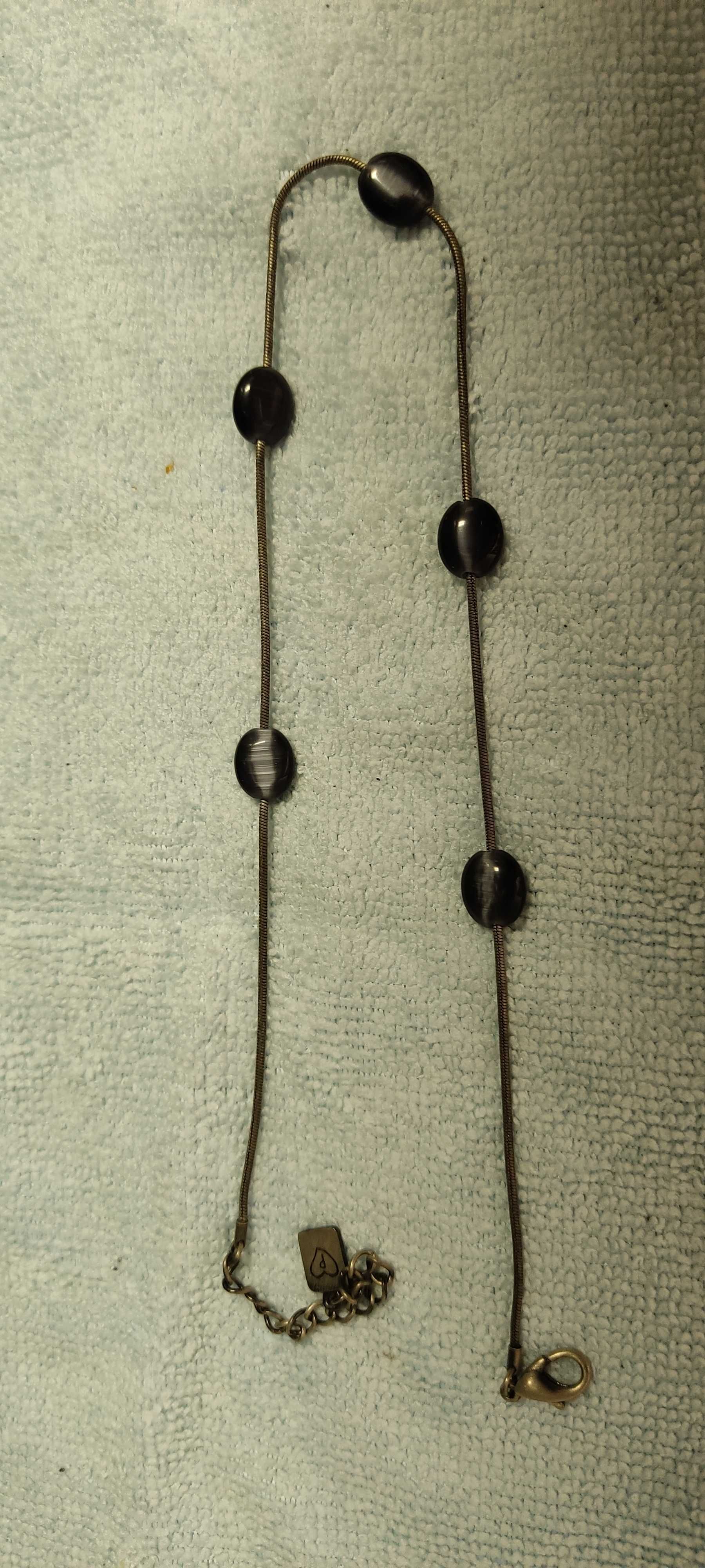 Bijuteria (brincos; anel)